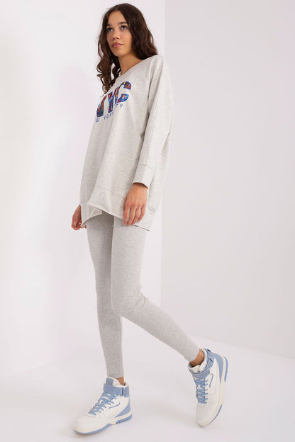 Elegant women's sweatshirt and leggings set by Factory Price, made of high-quality cotton blend for a chic, relaxed look.