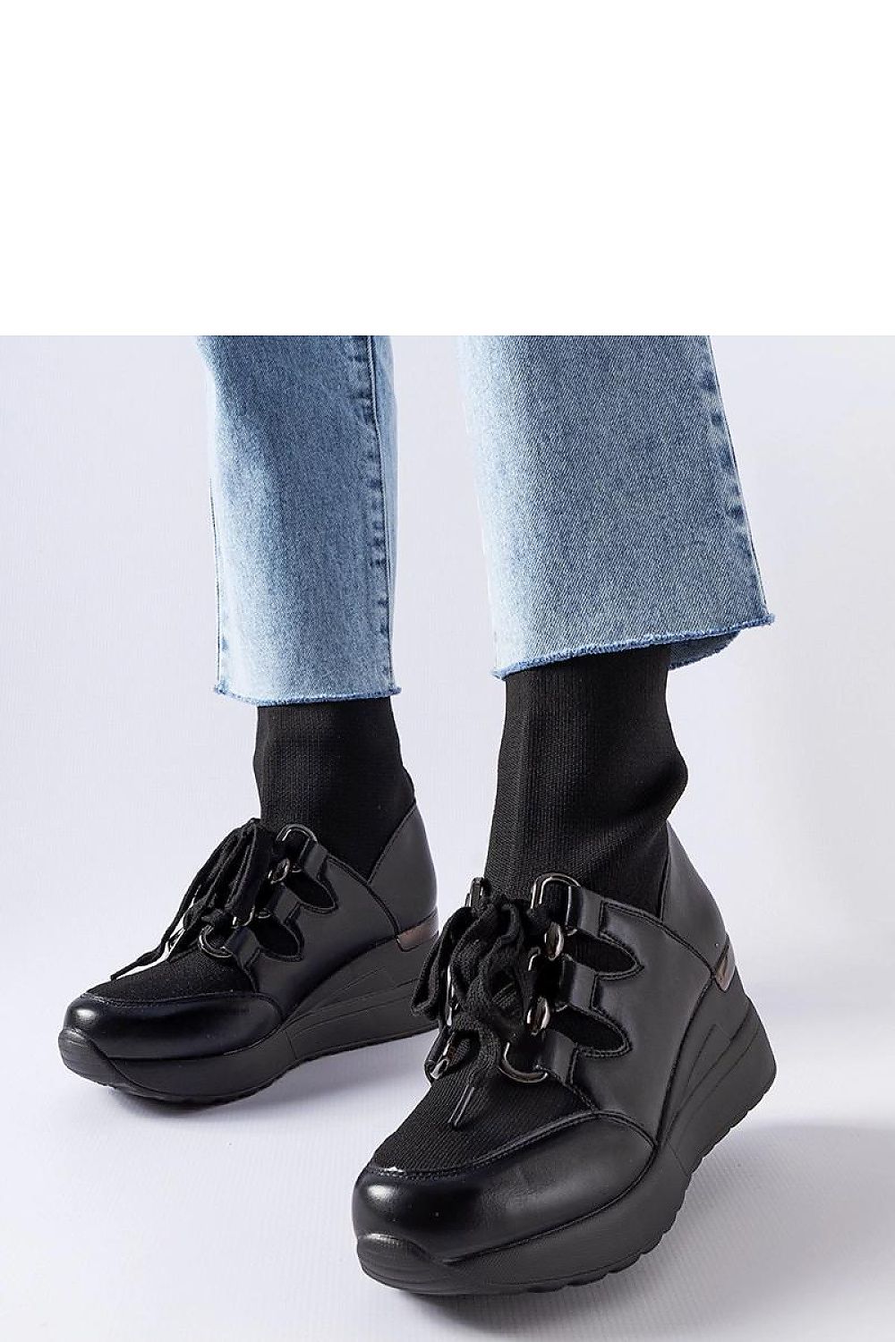 Solea Rochon Black Platform Boots for Women showcasing elegant comfort and a chic medium heel, perfect for autumn and winter outfits.