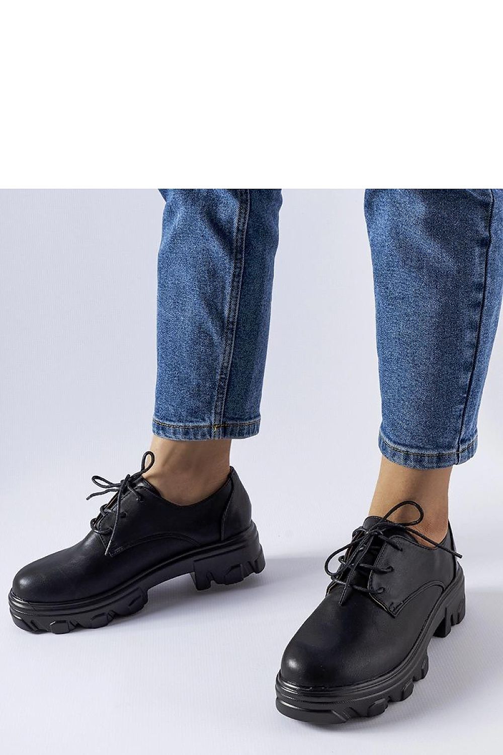 Solea Elegant Black Lacquered Kelly Half Shoes showcasing their eco leather finish and stylish design, ideal for modern women.