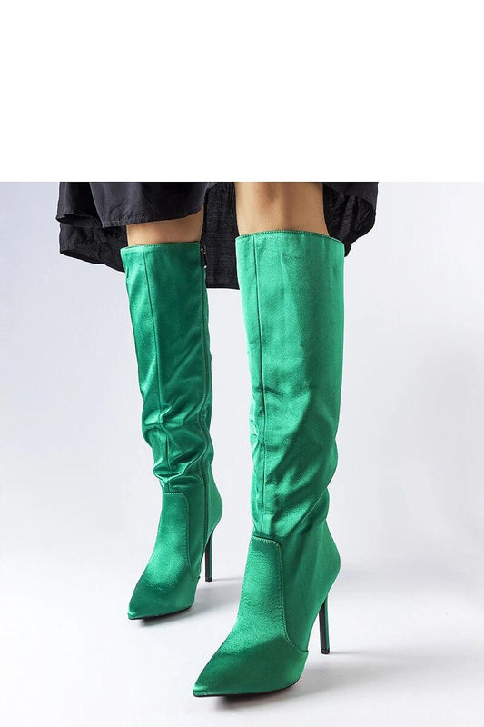 Solea's luxurious green Marlengo stiletto boots for women, showcasing a sleek design with an elegant spiked toe and a towering 11 cm high heel, ideal for fashionable autumn and spring outfits.