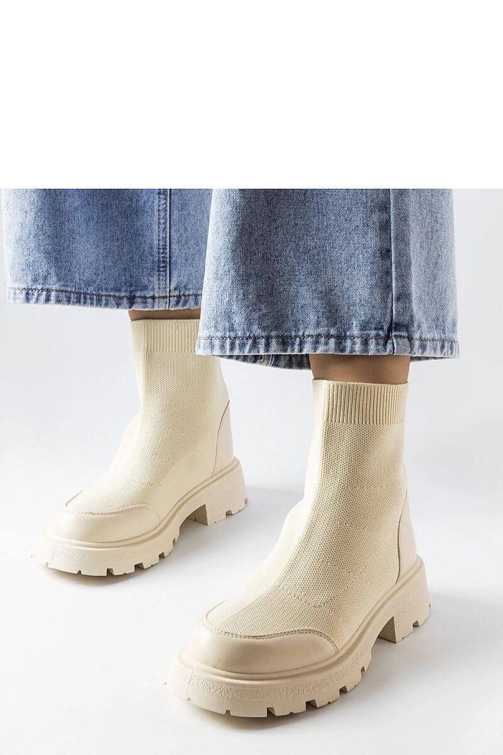 Lonte Beige Sock Boots by Solea showcasing elegant high upper, round toe, and medium heel, perfect for stylish comfort.