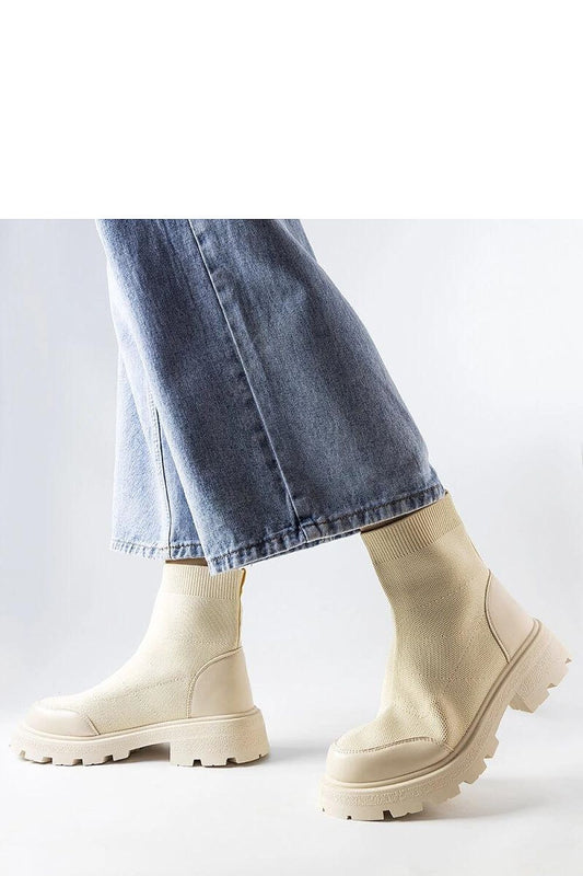 Close-up of Lonte Beige Sock Boots by Solea, highlighting the premium fabric and chic design for sophisticated outfits.