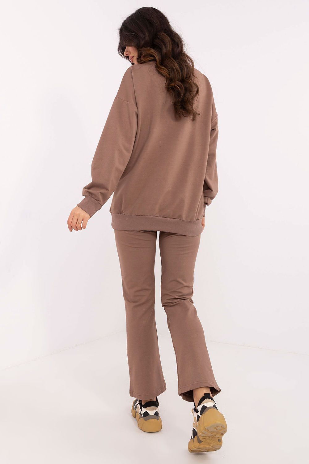 Close-up of the elegant wrap neckline and subtle patch detail of the luxury long-sleeve blouse in the Women's 2-Piece Set by Factory Price.