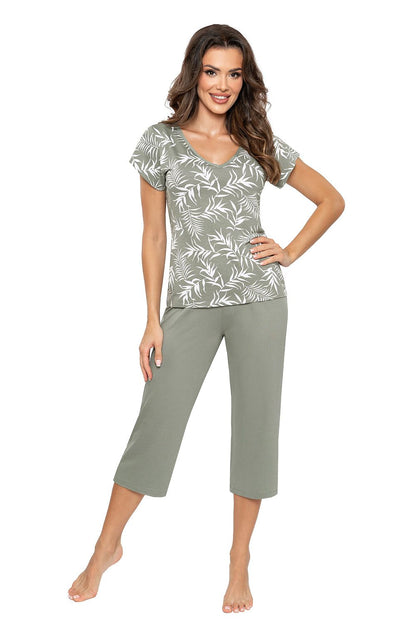 Elegant Donna women's pyjamas set featuring a soft, breathable viscose and spandex blend, showcasing a lovely leaf pattern blouse and olive-coloured 3/4 length pants for luxurious comfort.