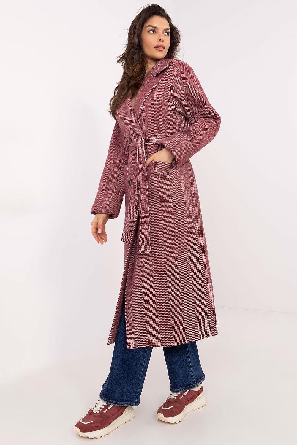 Elegant double-breasted women's coat by Lakerta, featuring a stylish belted waist and crafted from high-quality wool blend, perfect for cooler seasons.