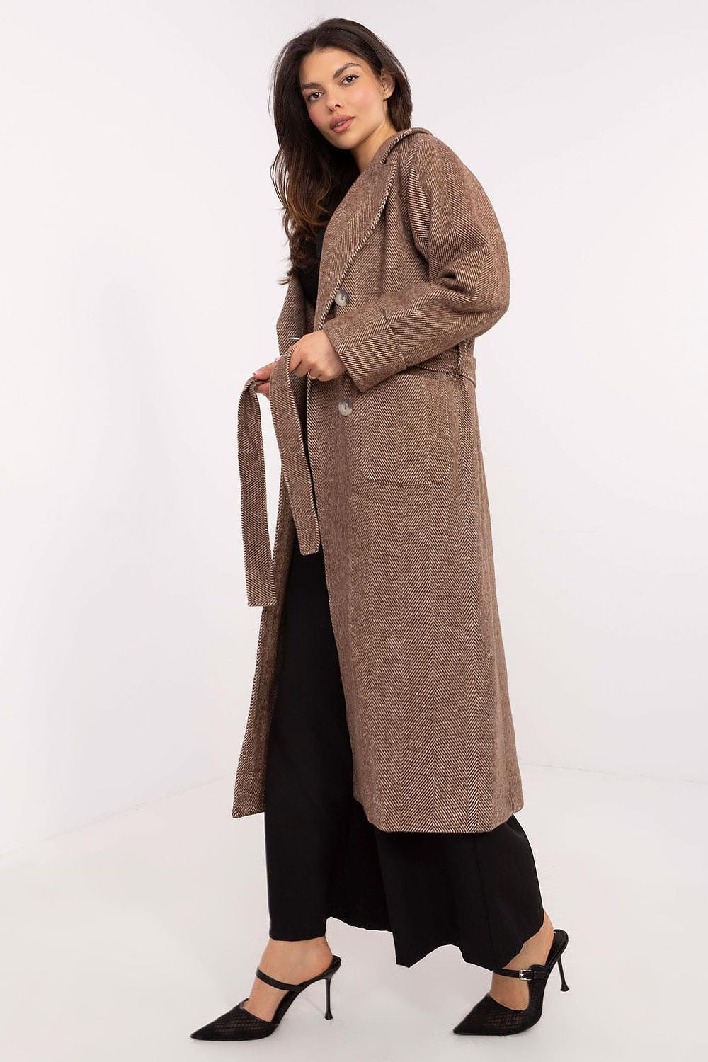 Back view of Lakerta women's long coat with quilted lining, highlighting the exquisite craftsmanship and elegant silhouette.