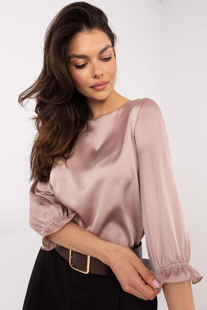 Luxurious Lakerta blouse designed with a minimalist smooth pattern, ideal for both work and formal occasions.