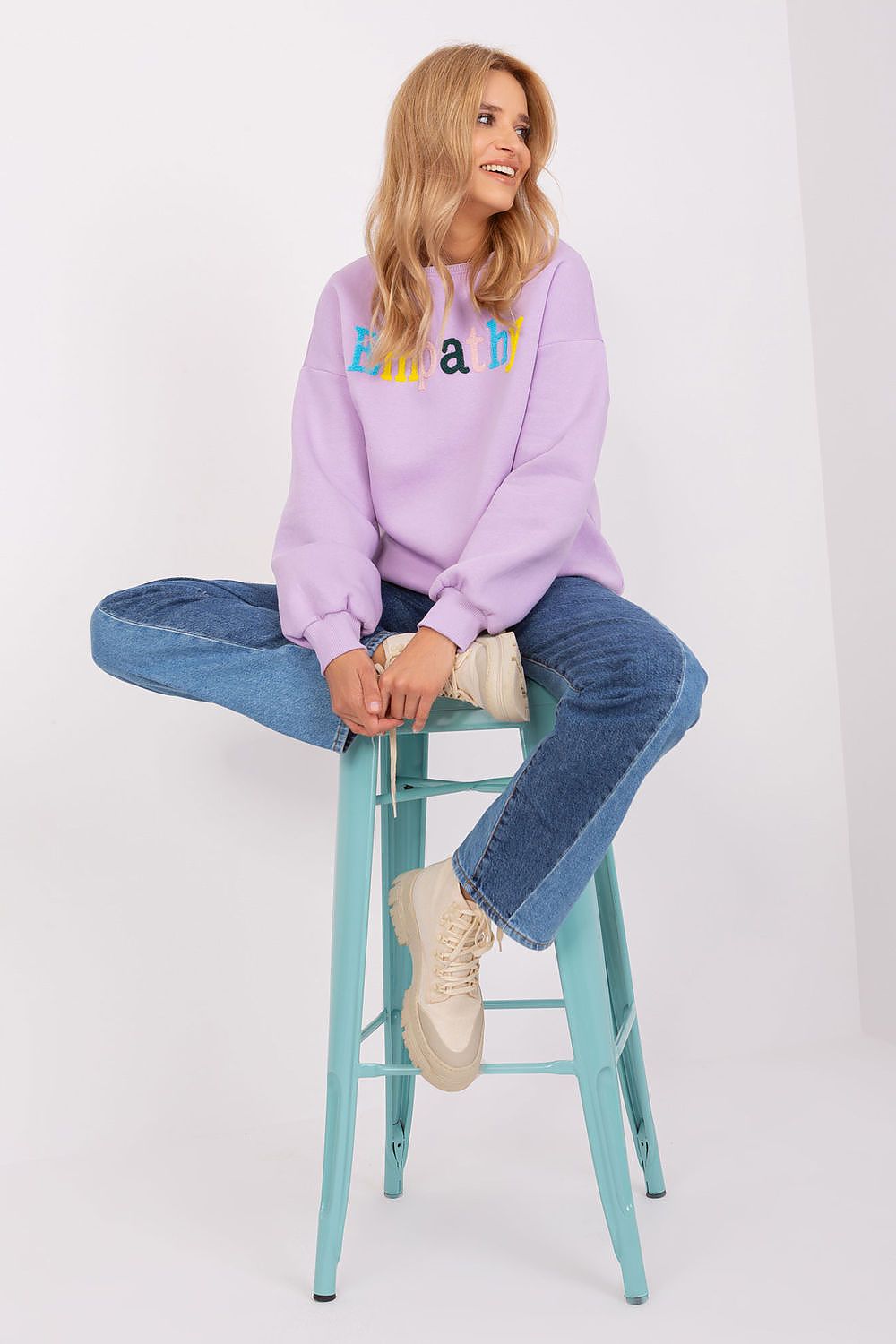 Contemporary women's sweatshirt by Factory Price, highlighting a modern design with varied texture suitable for any stylish ensemble.