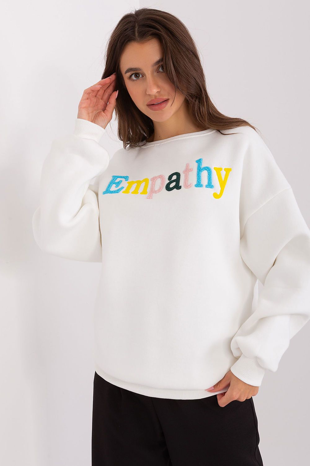 Factory Price women's sweatshirt in EU size 0, designed with long sleeves and a chic front inscription for a distinctive look.