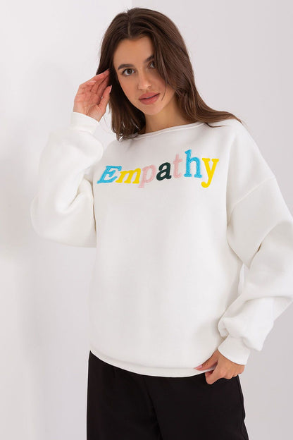 Factory Price women's sweatshirt in EU size 0, designed with long sleeves and a chic front inscription for a distinctive look.