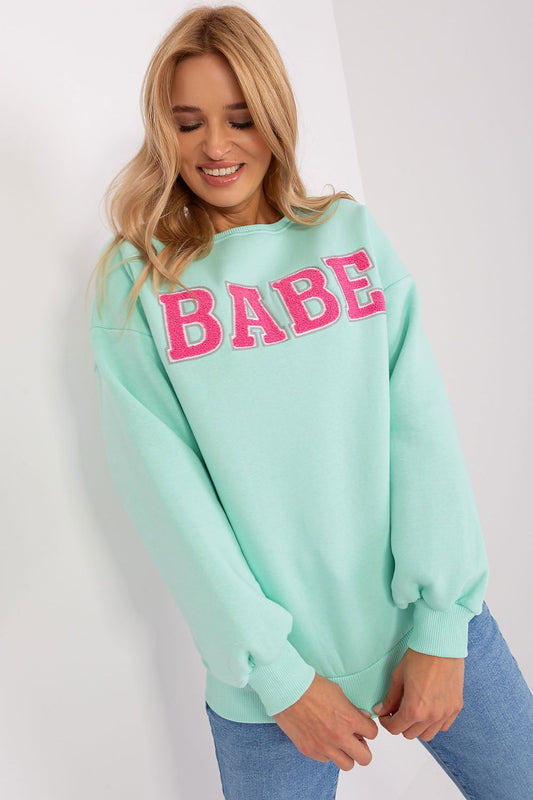 Elegant women's casual sweatshirt with unique pattern and inscription by Factory Price, showcasing modern design and comfortable fit in EU size 0.