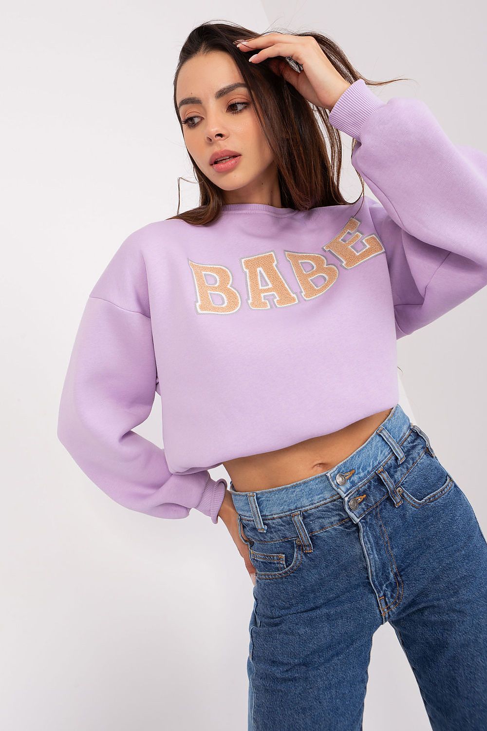Elegantly designed women's casual sweatshirt by Factory Price, showcasing a unique pattern and front inscription, perfect for a stylish everyday look.