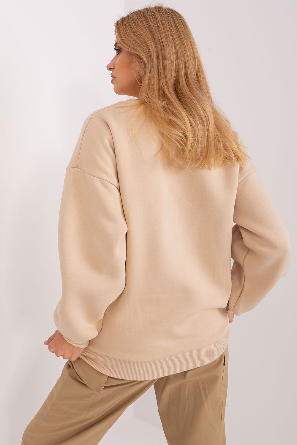 Back view of Factory Price Luxury Women's Pullover Sweatshirt, illustrating versatility and modern charm, ideal for cooler days while maintaining style and comfort.