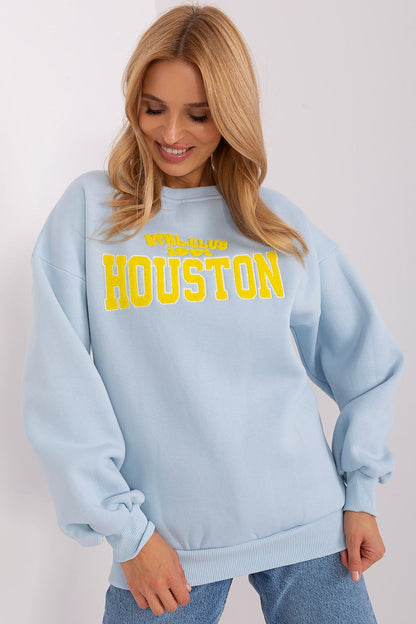 Lifestyle image of a model wearing Factory Price Luxury Women's Pullover Sweatshirt in EU Size 0, exemplifying its blend of sporty and casual fashion.