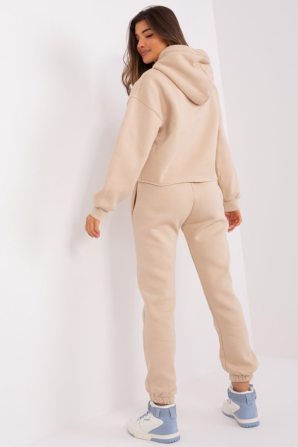 Close-up of Ex Moda's plush cotton blend fabric in the casual tracksuit set, highlighting its sophisticated texture and comfort.