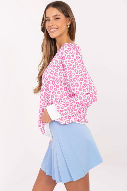 Italy Moda Women's Casual Animal Print Blouse, styled with elegant trousers, embodying a perfect fusion of comfort and high-end fashion.