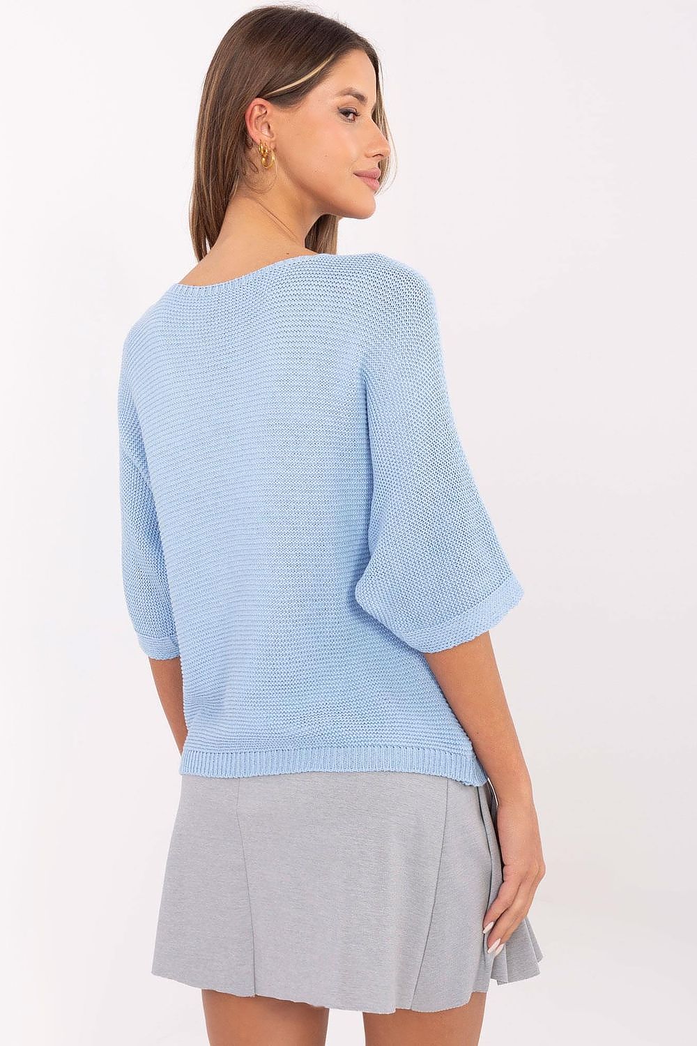 Elegant display of Italy Moda Women's V-Neck Sweater in EU Size 0, accentuating its unique teddy bear motif and luxury fabric.