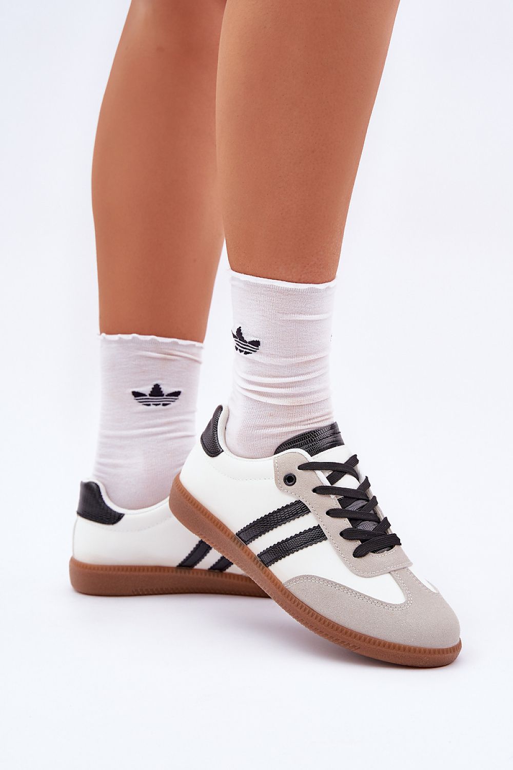 Step In Style eco-leather and suede low women's sneakers, showcasing a blend of luxury, comfort, and style. Perfect for casual and sporty outfits, featuring a classic lace-up design.