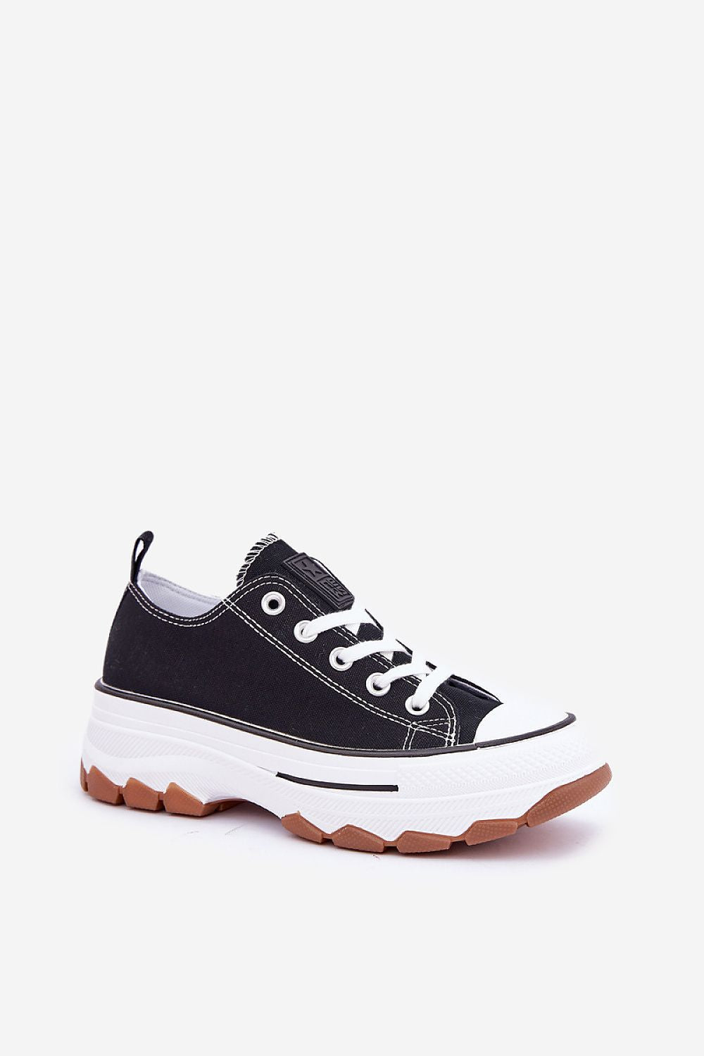 Close-up detail of Step In Style women's platform sneakers made from high-quality textile material, featuring a stylish and comfortable design ideal for any fashionable outing.