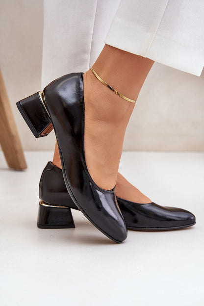 Elegant Step In Style leather heel pumps styled for a chic look, showcasing the soft leather insole and 4cm heel height for all-day comfort.