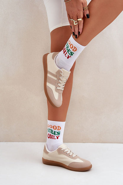 Step In Style Eco-Leather Sneakers featuring a rounded toe design, perfect for enhancing casual elegance in a woman's wardrobe.