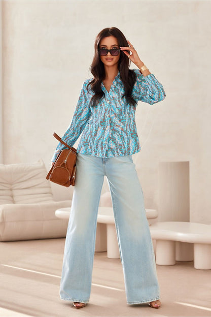 Luxurious Roco Fashion women's shirt in classic polyester with buttoned long sleeves, designed with a versatile V-neckline for an elegant look, available in sizes EU 36-42.