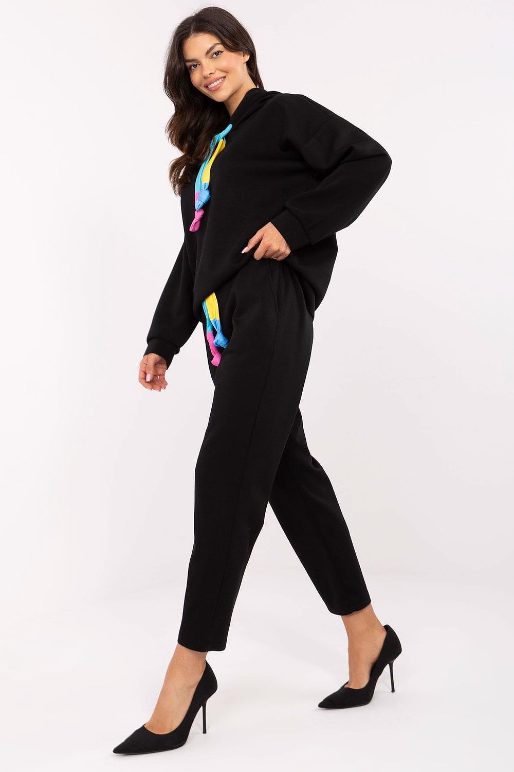 Stylish Italy Moda casual sweat suit, showcasing a long-sleeved hooded sweatshirt and tailored pants, ideal for chic everyday fashion.