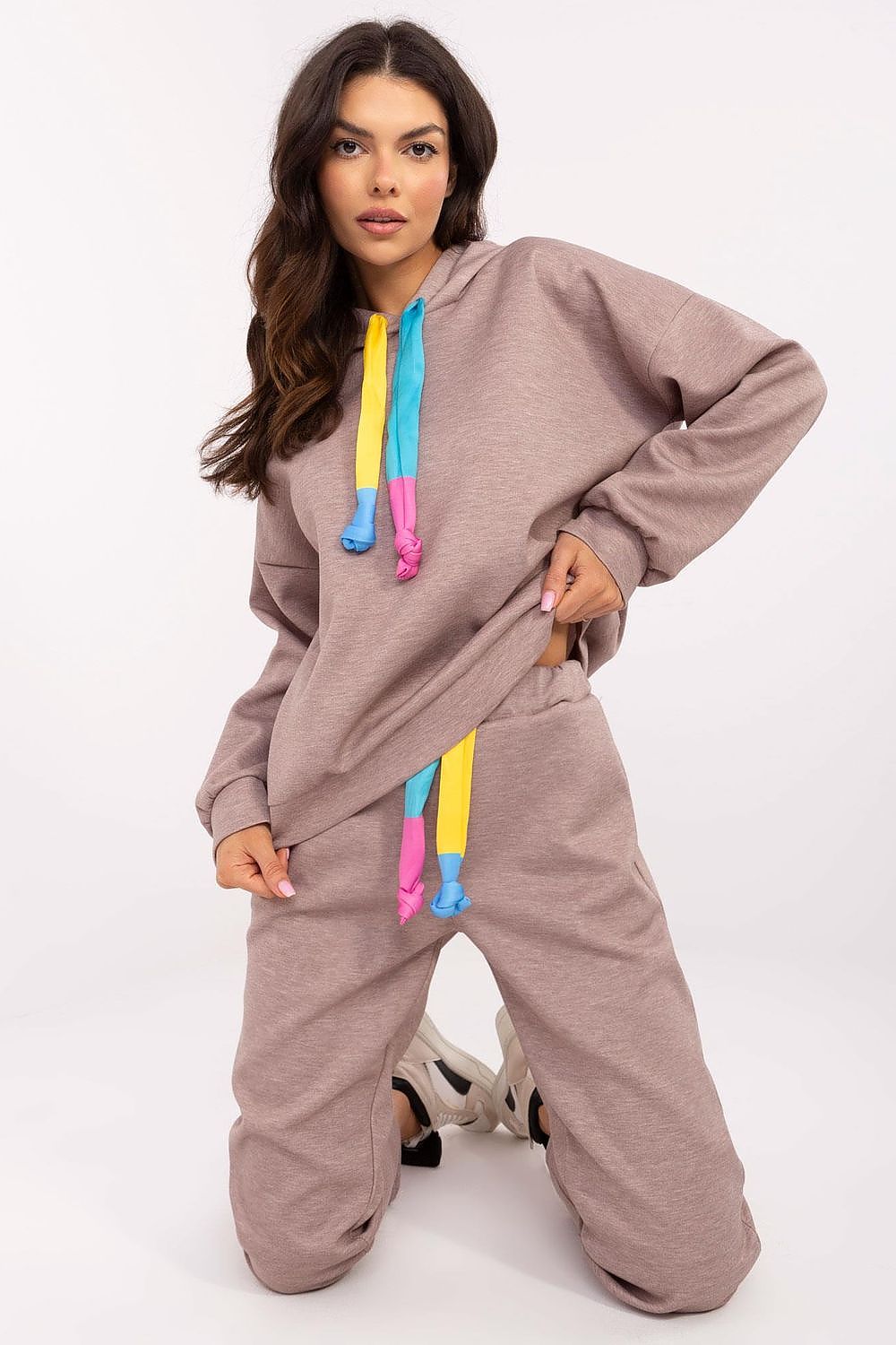 Stylish Italy Moda sweat suit set showcasing comfortable polyester, viscose, and elastane blend, perfect for casual outings.