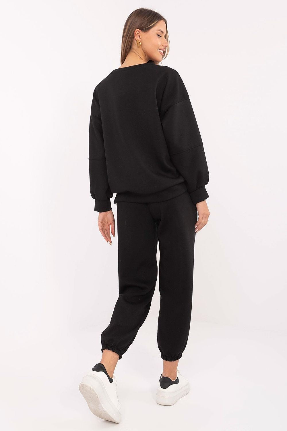 Italy Moda women's casual tracksuit set, featuring a standard-length sweatshirt with long sleeves and round neckline for effortless elegance.