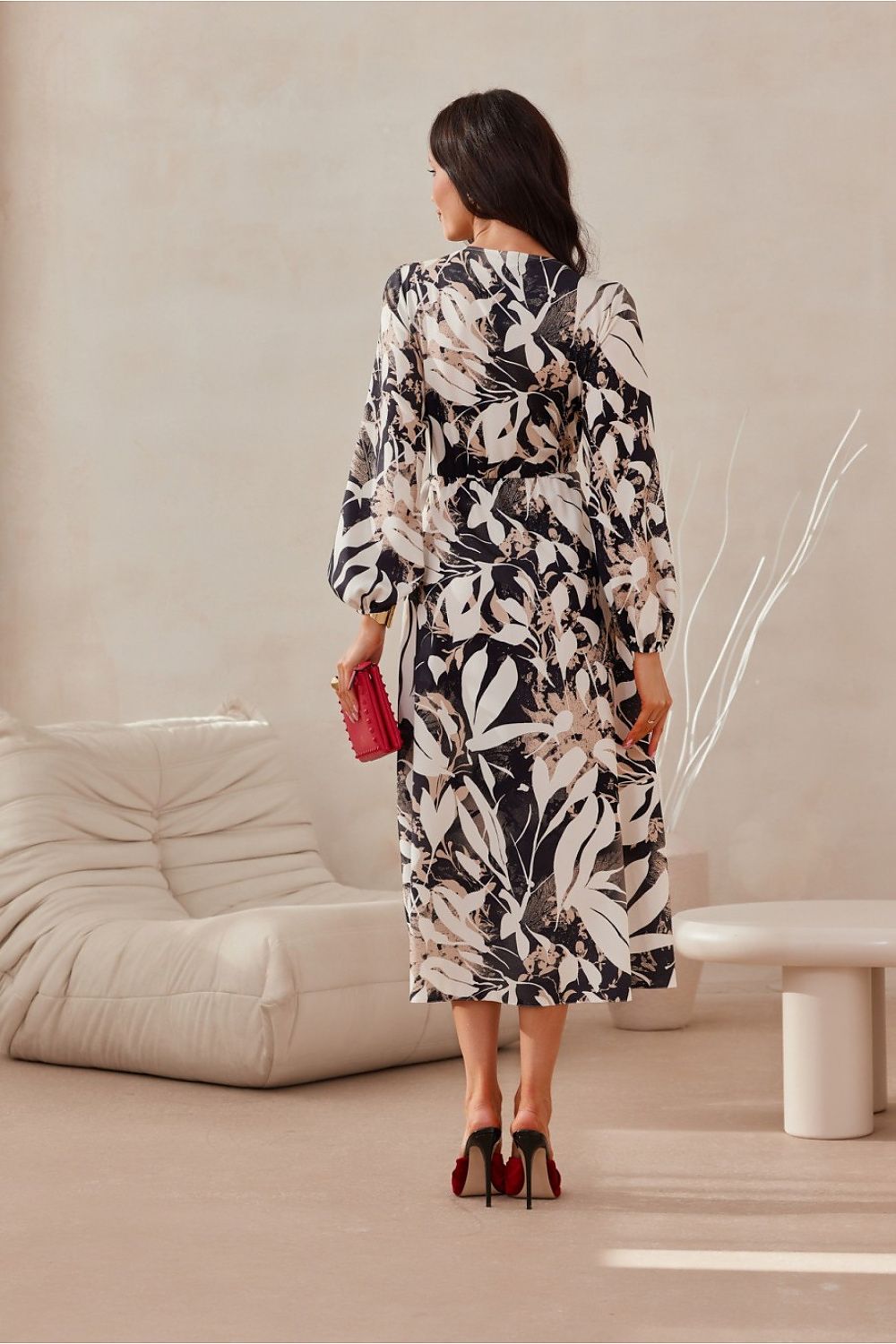 Elegantly designed Roco Fashion midi dress featuring long sleeves and a sophisticated wrap top, perfect for chic occasions.