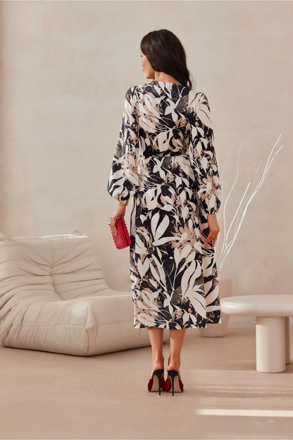 Elegantly designed Roco Fashion midi dress featuring long sleeves and a sophisticated wrap top, perfect for chic occasions.