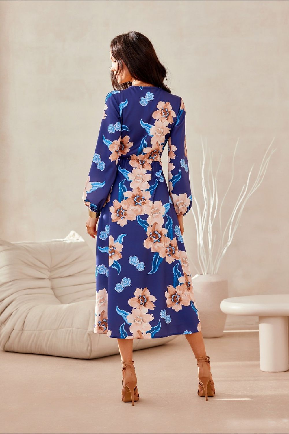 Full view of the Roco Fashion midi dress with a flared skirt and long sleeves, epitomizing luxury in women's fashion.