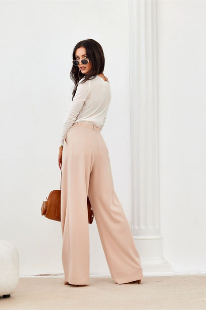 Chic Roco Fashion Women's trousers with an elastic waistband and generous wide legs, exemplifying refined fashion with practicality and grace.