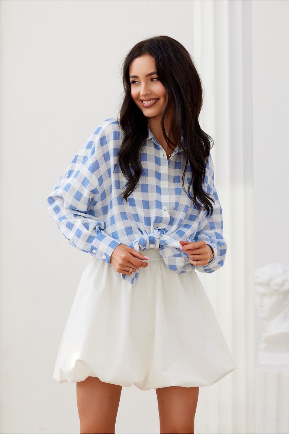 Roco Fashion oversized long sleeve cotton shirt with decorative cuffs, showcasing luxury style and comfort in a sophisticated asymmetric cut.