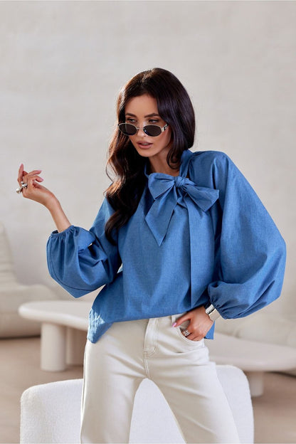 Elegant Roco Fashion cotton blouse featuring long puffy sleeves and decorative lacing, available in sizes EU 36 to 40.