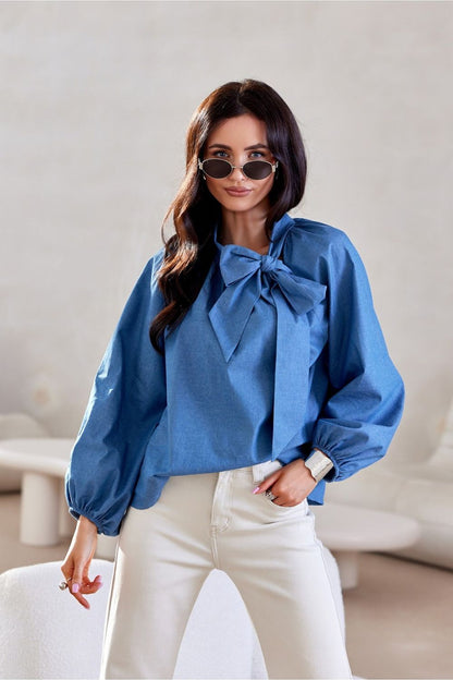 Luxurious Roco Fashion cotton blouse featuring long puffy sleeves and decorative lacing, available in sizes EU 36 to 40.