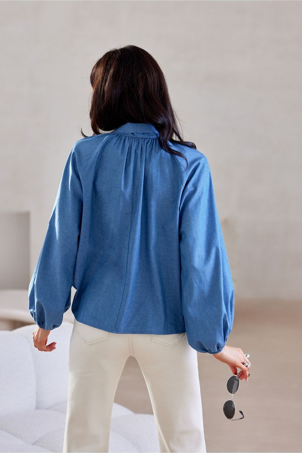 Elegant Roco Fashion blouse in cotton with long tapered sleeves, embellished neckline, suitable for sizes EU 36 to 40.
