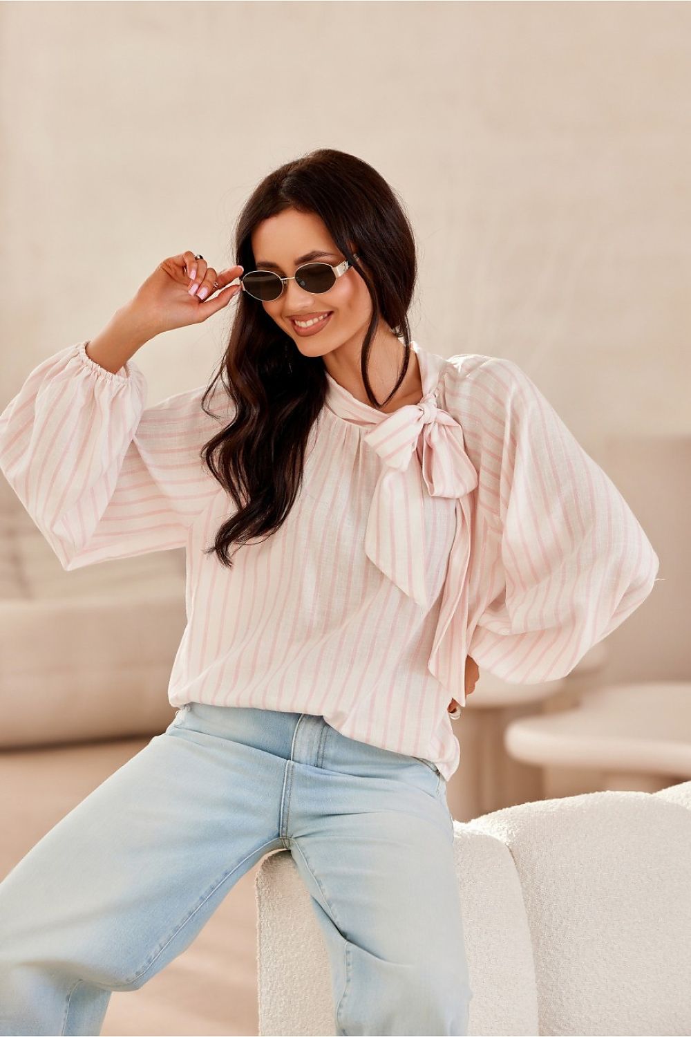 Close-up of Roco Fashion's elegant blouse showcasing intricate neck lacing and rich, comfortable fabric, perfect for stylish women in sizes EU 36 to 40.