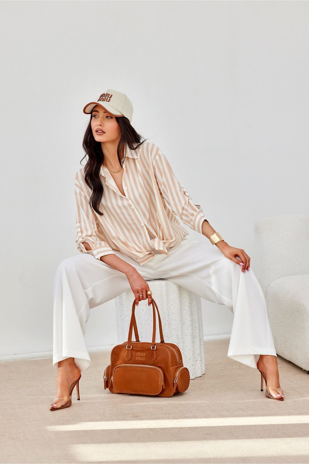 Close-up of Roco Fashion oversized long sleeve shirt highlighting the intricate decorative cuffs, crafted from premium 95% polyester fabric for a luxe feel.