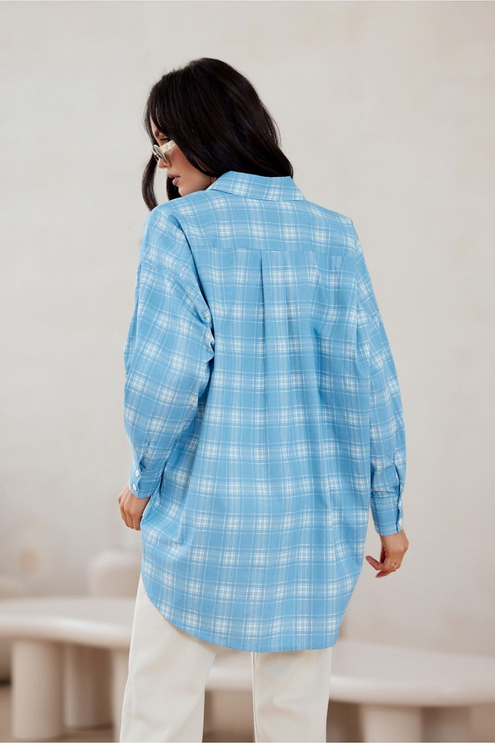 Roco Fashion oversized shirt showcasing its stylish asymmetrical cut and premium cotton fabric for a fashionable look.