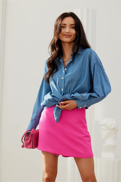 Close-up view of Roco Fashion's decorative buttoned cuffs on the stylish oversized long sleeve shirt, designed for a sophisticated look.