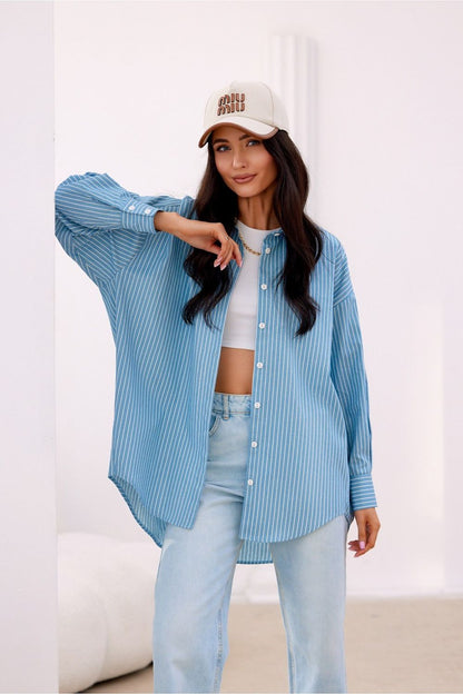 Elegant styling of Roco Fashion's oversized shirt, highlighting the unique button-down front and premium cotton texture.