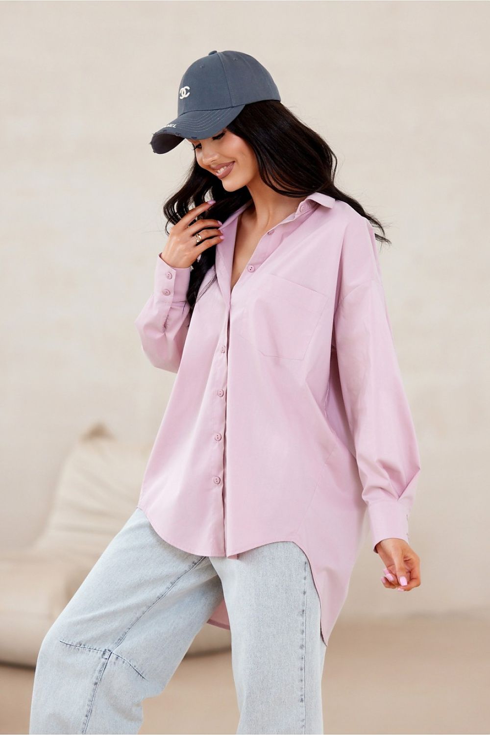 Elegant Roco Fashion women's asymmetrical long sleeve shirt in luxurious fabric, showcasing an oversized fit and sophisticated collar design.