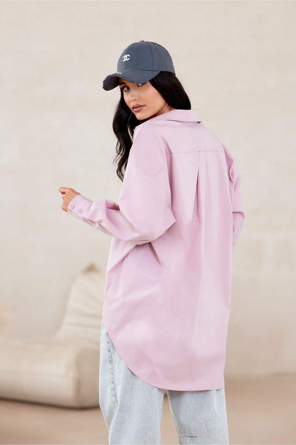 Fashion-forward Roco Fashion oversized long sleeve shirt, emphasizing comfort and style with its unique asymmetrical design and premium fabric.