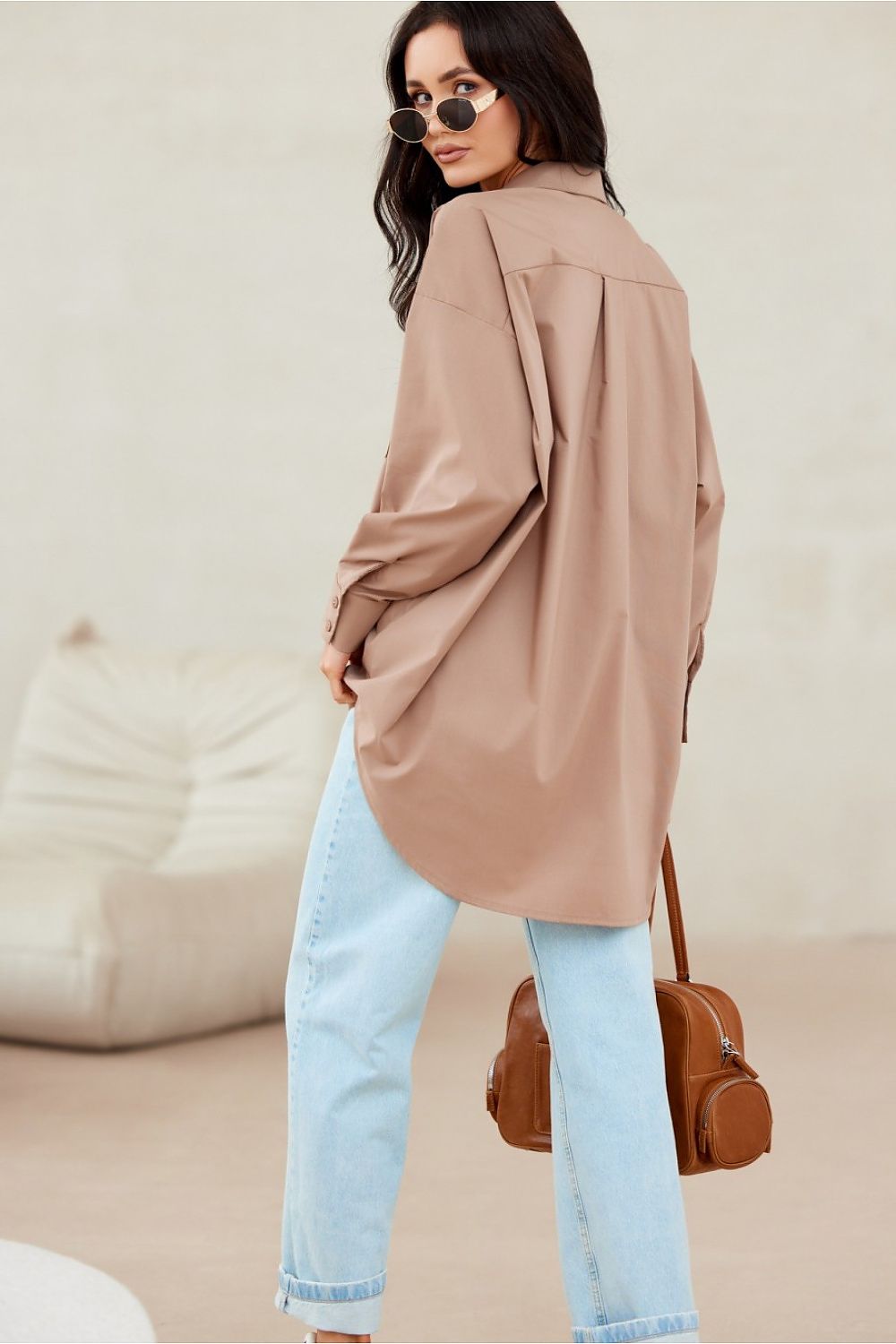 A vibrant selection of Roco Fashion Women's Asymmetrical Long Sleeve Shirts in multiple colours, demonstrating the sophisticated design and exceptional craftsmanship.