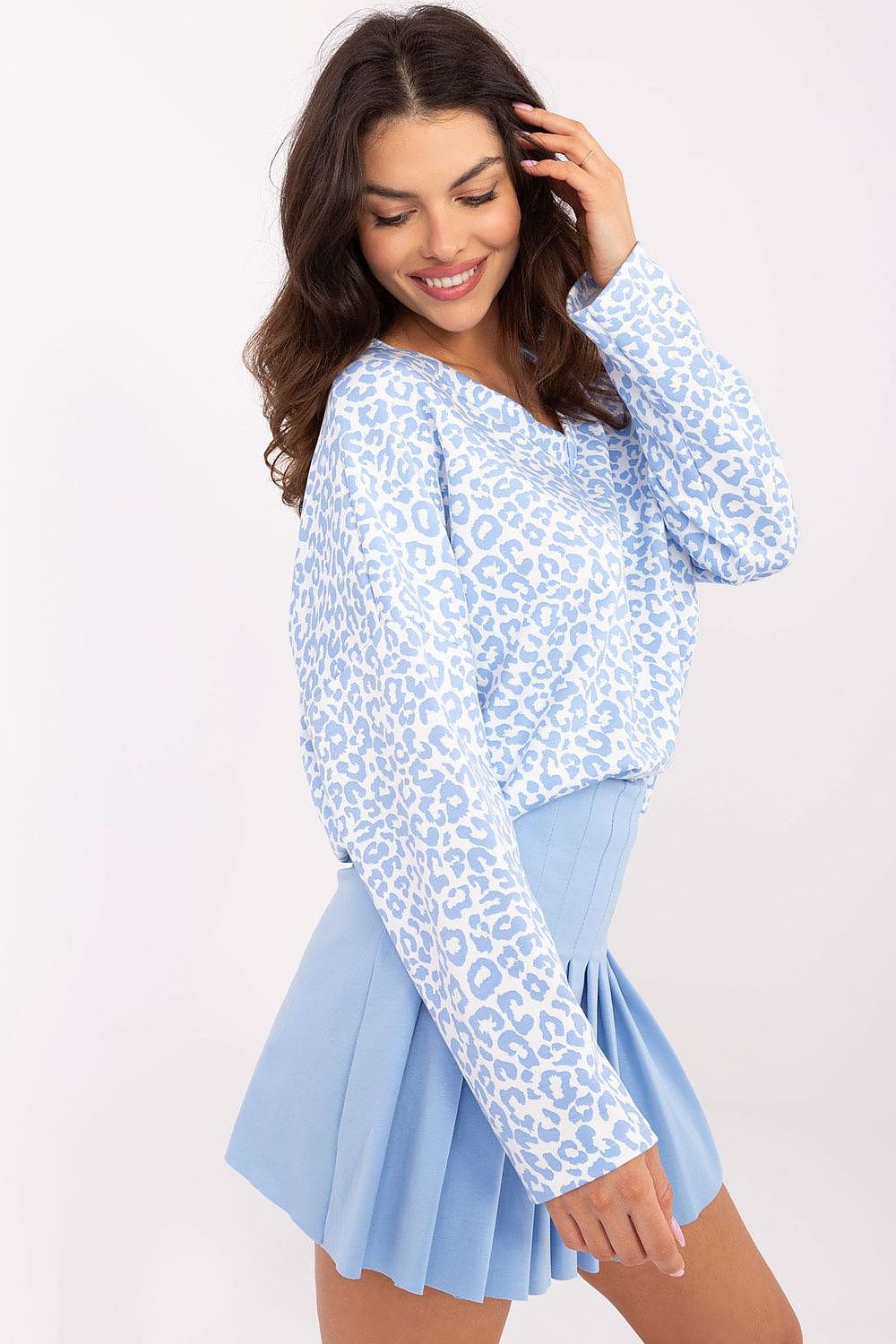 Elegant Italy Moda women's blouse, EU size 0, designed with a trendy animal pattern, perfect for versatile styling occasions.