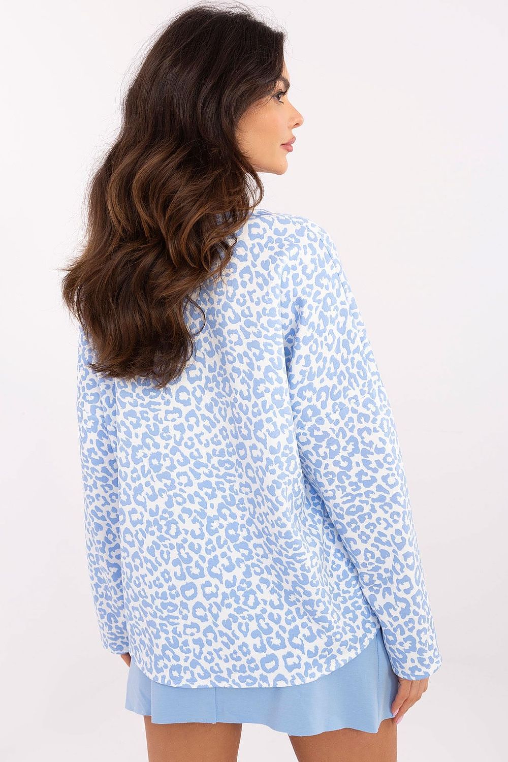 Fashion-forward Italy Moda women's blouse in soft viscose blend, ideal for women seeking comfort and contemporary style with a sleek V-neck.