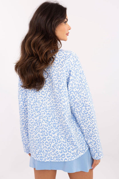 Fashion-forward Italy Moda women's blouse in soft viscose blend, ideal for women seeking comfort and contemporary style with a sleek V-neck.