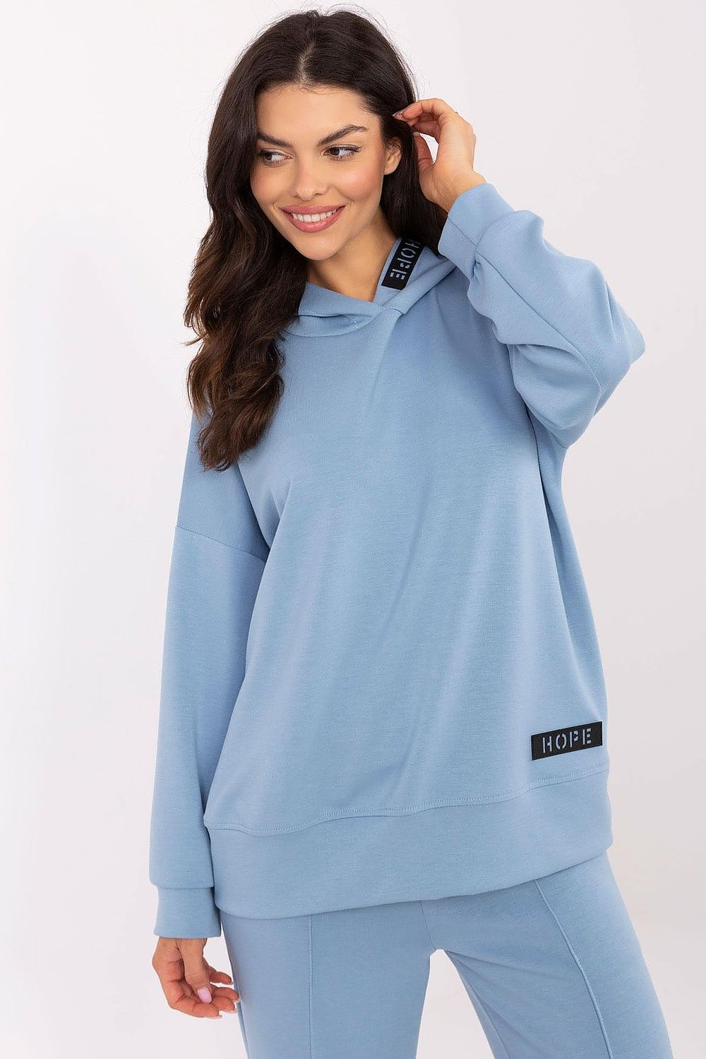 Soft and fashionable Italy Moda hooded sweatshirt showcasing unique design details, ideal for women who appreciate casual yet luxurious attire.