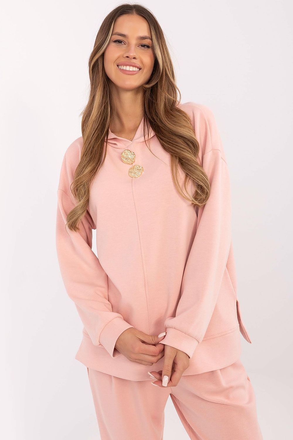 Luxurious Italy Moda Women's Sweatshirt Blouse in soft polyester blend with unique side slits and stylish detachable brooches, perfect for versatile fashion.
